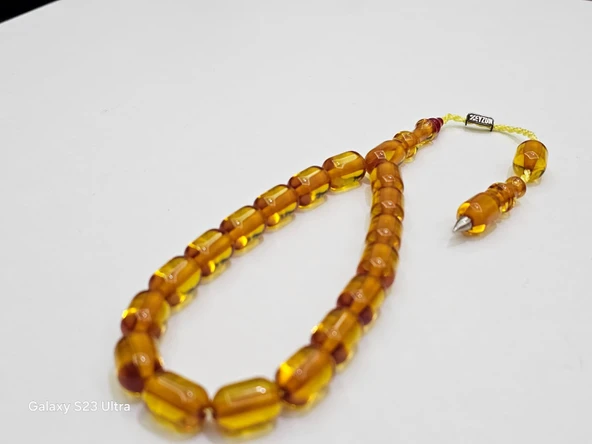 Zeyzun Usta Bilek Boy Efe Maskot Sıkma Kehribar Tespih 16x11 mm Kapsül Kesim ürün görseli 1