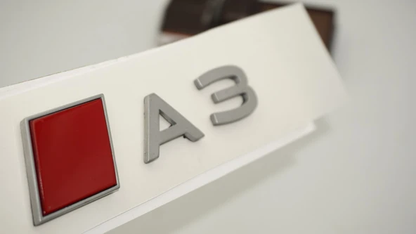 DK Tuning A3 2025+ Bagaj Gümüş Kırmızı Yazı Logo Arma Audi İle Uyumlu ürün görseli 1
