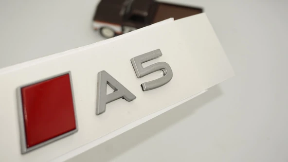 DK Tuning A5 2025+ Bagaj Gümüş Kırmızı Yazı Logo Arma Audi İle Uyumlu ürün görseli 1