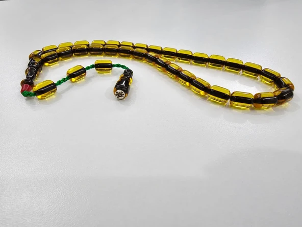 Zeyzun Usta İmzalı Sıkma Kehribar Tespih 9x12 mm Kapsül Kesim ürün görseli 1