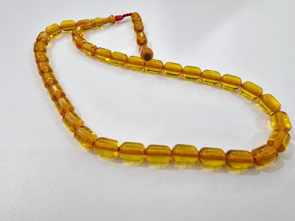 Zeyzun Usta İmzalı Sıkma Kehribar Tespih 9x13 mm Kapsül Kesim ürün görseli 1
