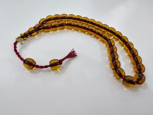 Mehmet Başkut Usta İmzalı Faturan Sıkma Kehribar Tesbih (11,3×13,2 mm) Fıçı Kesim ürün görseli 1