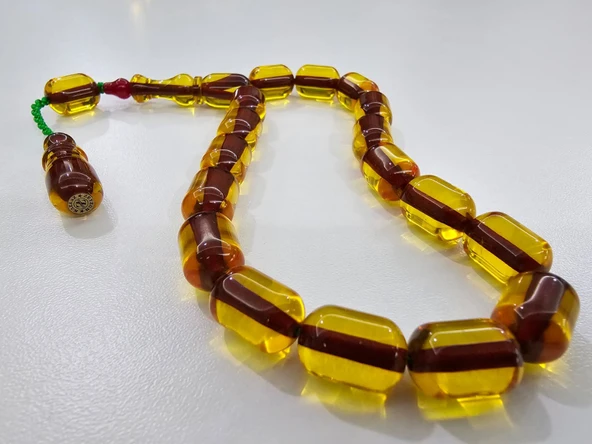 Zeyzun Usta İmzalı Bilek Boy Efe Maskot Sıkma Kehribar Tespih 15 x 11 mm Kapsül Kesim ürün görseli 1