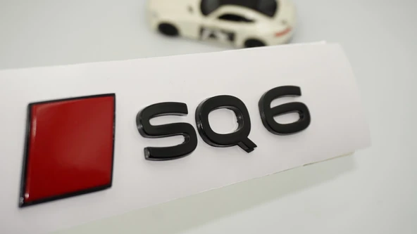 DK Tuning SQ6 2025+ Bagaj Siyah Kırmızı Yazı Logo Arma Audi İle Uyumlu ürün görseli 1