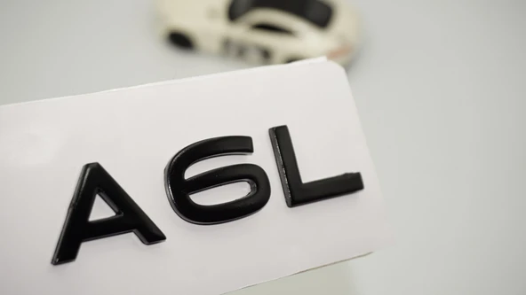 DK Tuning A6L 2025+ Yeni Nesil Bagaj Siyah Yazı Logo Arma Audi İle Uyumlu ürün görseli 1