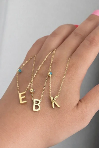 HARF KOLYE NAZAR BONCUKLU -B HARFİ- GOLD -316L KARARMAZ ÇELİK ürün görseli 1
