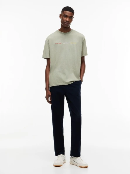TJM REG TJ REPEAT SS TEE Erkek Yeşil T-Shirt - DM0DM23180 ürün görseli 1