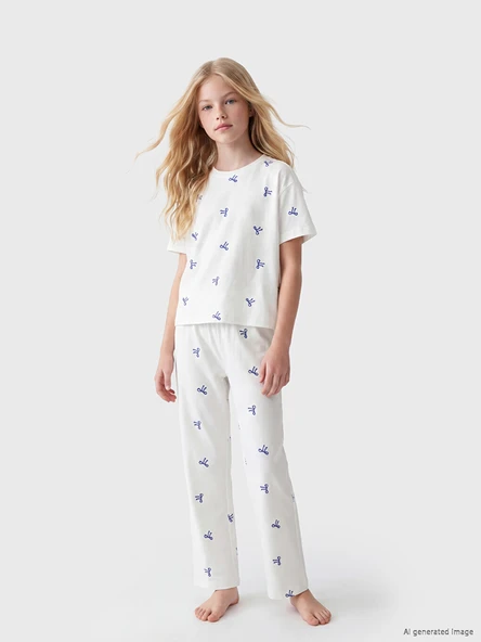 LCW Kids Ekru Fiyonk Baskılı Kız Çocuk Pijama Takımı ürün görseli 1