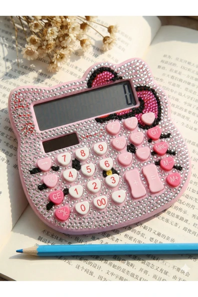 Zilvana Elmas Taşlı Fiyonk Detaylı Kalp Şeklinde Düğme Tasarımlı 12 Haneli Mini Pembe-Gümüş Hesap Makinesi ürün görseli 1