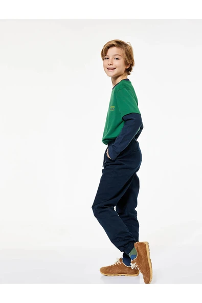 Koton Erkek Çocuk Beli Bağcıklı Cep Detaylı Pamuklu Gabardin Jogger Pantolon ürün görseli 1