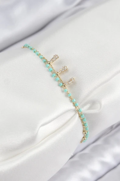 Mey İthalat® Pirinç Zirkon Taşlı Mavi Boncuklu Model Gold Renk Kadın Bileklik ürün görseli 1