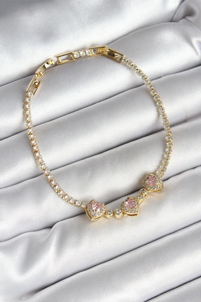 Pirinç Sıralı Pembe Figürlü Zirkon Taşlı Gold Renk Kadın Bileklik ürün görseli 1