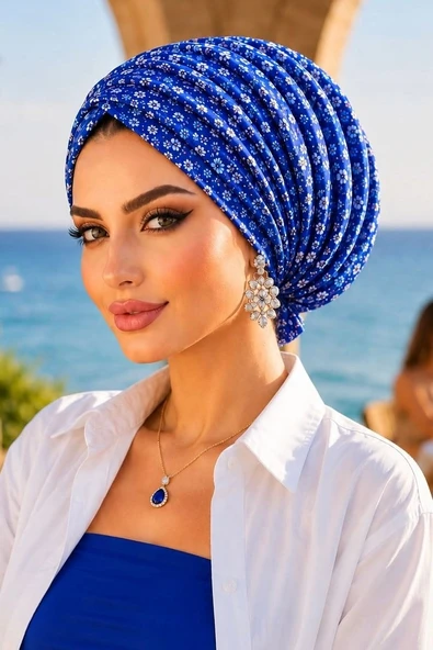 Saks Mavi Çiçek Desenli Tokalı Bone ürün görseli 1