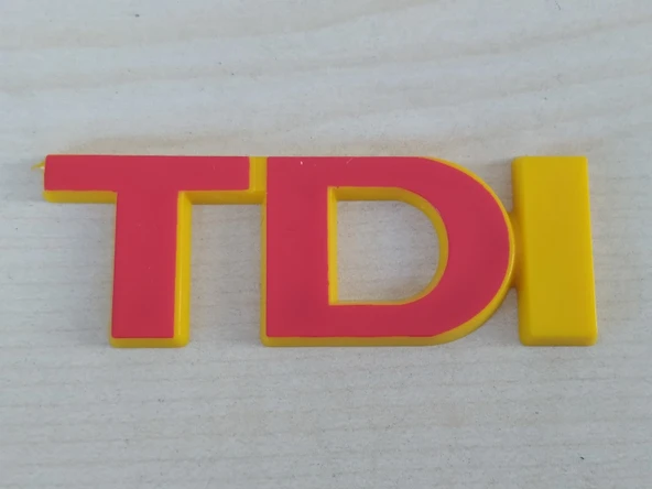 TDI BAGAJ YAZISI KIRMIZI-SARI (PLASTİK) TDI ARMASI, TDI YAZISI, TDI LOGOSU ürün görseli 1