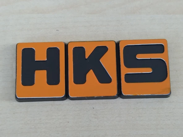 HKS YAZISI 6x2,5cm KABARTMA SPORT ARMA TURUNCU (HKS ARMASI) HKS LOGOSU ürün görseli 1