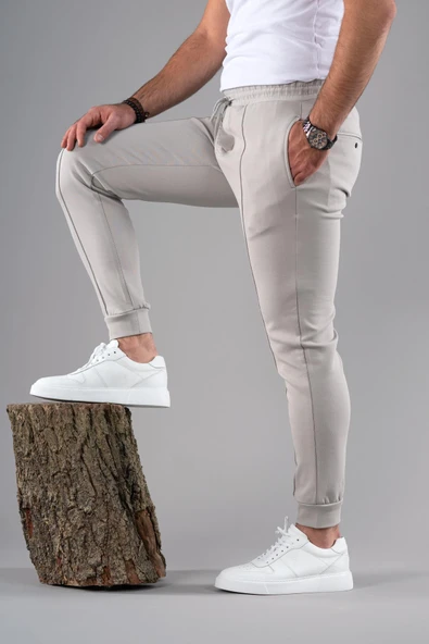 SLİMFİT DAR PAÇA BELİ LASTİKLİ İPLİKLİ LİKRALI JOGGER PANTOLON ürün görseli 1