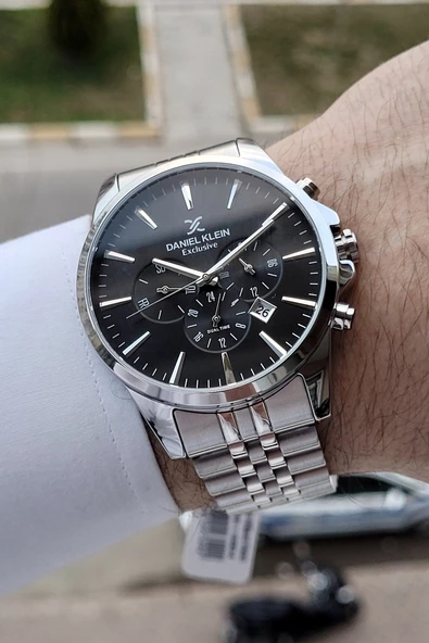 Daniel Klein DKISTE395 Fonksiyonları Aktif 2 Yıl Garantili Kadranı Siyah Kordonu Gümüş Renk Erkek Kol Saati ürün görseli 1