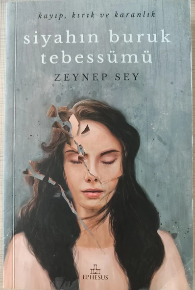 Siyahın Buruk Tebessümü ürün görseli 1