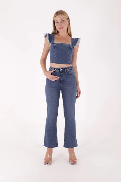 Geniş Paçalı ve Yüksek Belli Paçaları Dikişsiz Detaylı Esnek Mom Kadın Kot Pantolon Koyu Mavi Denim ürün görseli 1