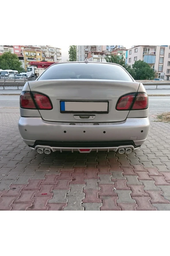 OTO H.İ.T.  NİSSAN PRİMERA UYUMLU BODY KİT DİFÜZÖR 4 ÇIKIŞ YUVARLAK GRİ MODEL 1 ürün görseli 1
