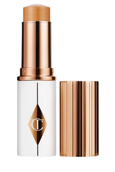 Charlotte Tilbury Unreal Skin Sheer Glow Tint 9 Tan - Nemlendirici Stick fondöten 8 ml ürün görseli 1